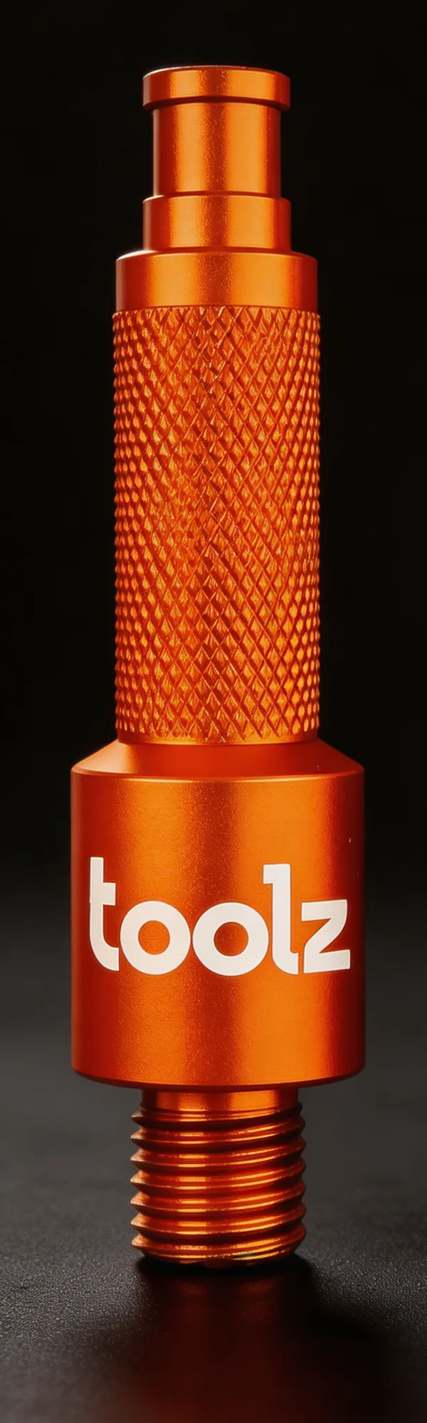 The orange Oil Drain Tool